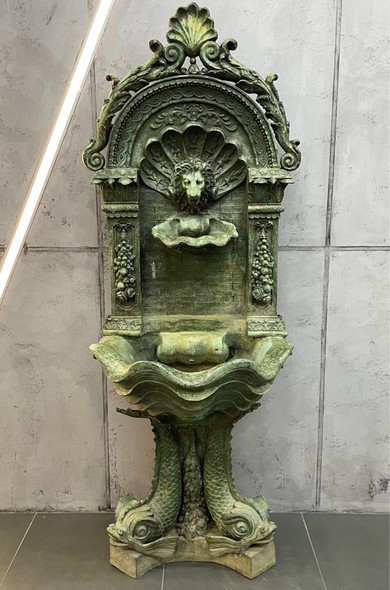Wall-mounted ancient fountain