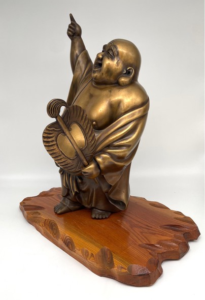 Antique sculpture "Hotei with Gumbai"