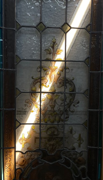 Antique pair of stained glass windows