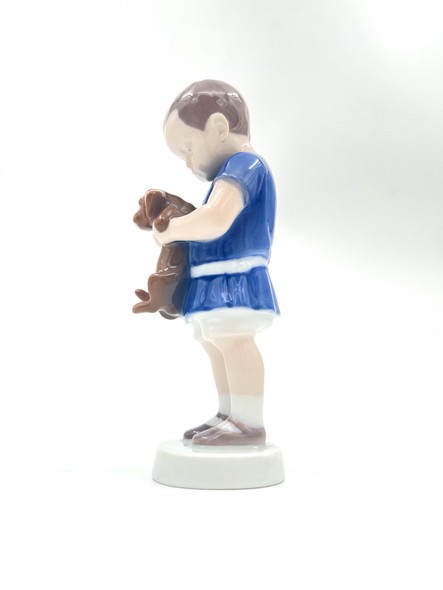 Antique figurine "Boy with a dachshund"