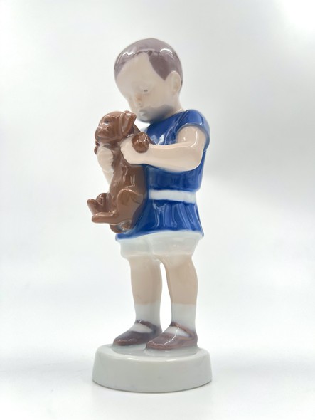 Antique figurine "Boy with a dachshund"