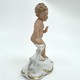 Antique figurine "Putti with a goatling"