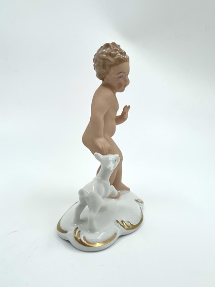 Antique figurine "Putti with a goatling"