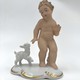 Antique figurine "Putti with a goatling"