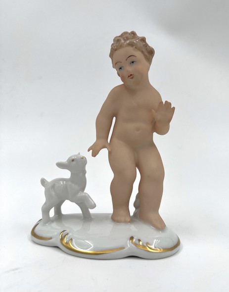 Antique figurine "Putti with a goatling"