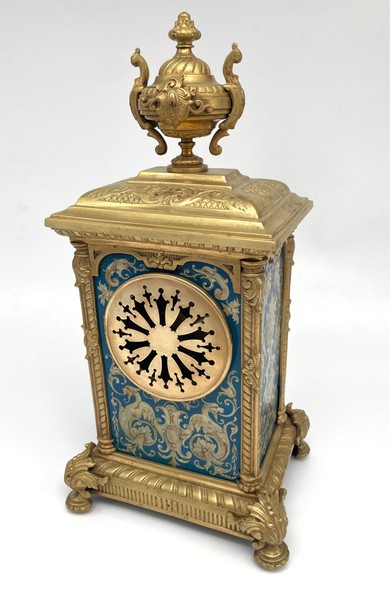 Antique clock in the style of classicism