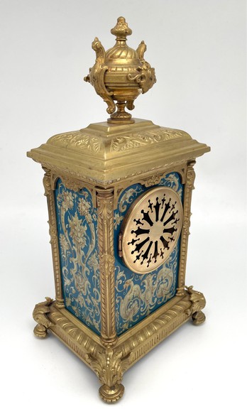 Antique clock in the style of classicism