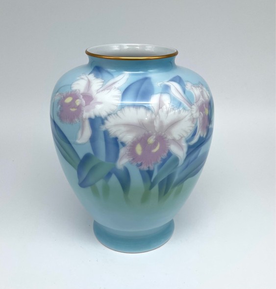 Vintage vase with lilies