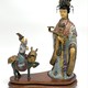 Antique composition "Qilin giving a child"