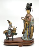 Antique composition "Qilin giving a child"