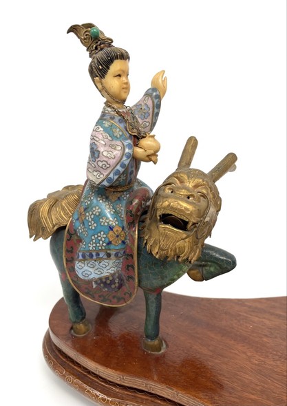 Antique composition "Qilin giving a child"