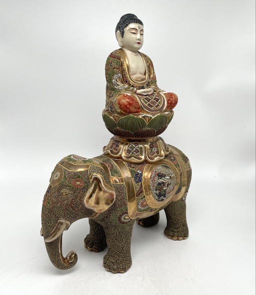 Antique sculpture "Elephant and Buddha"