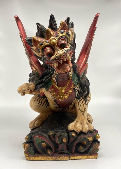 Antique statue of Balinese lion sing