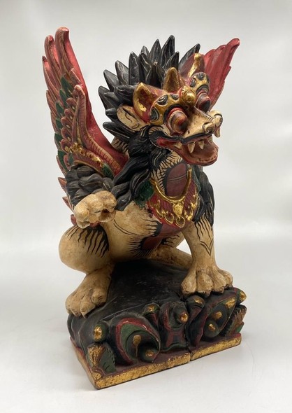 Antique statue of Balinese lion sing