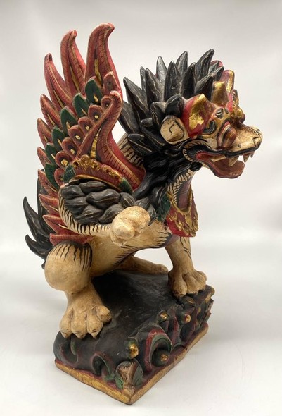 Antique statue of Balinese lion sing