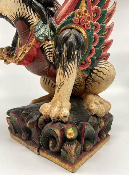 Antique statue of Balinese lion sing