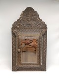 Antique wall mirror with brushes