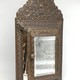 Antique wall mirror with brushes