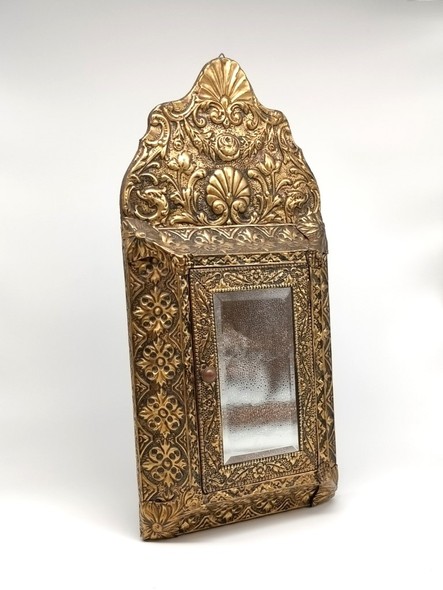 Antique wall mirror with brushes