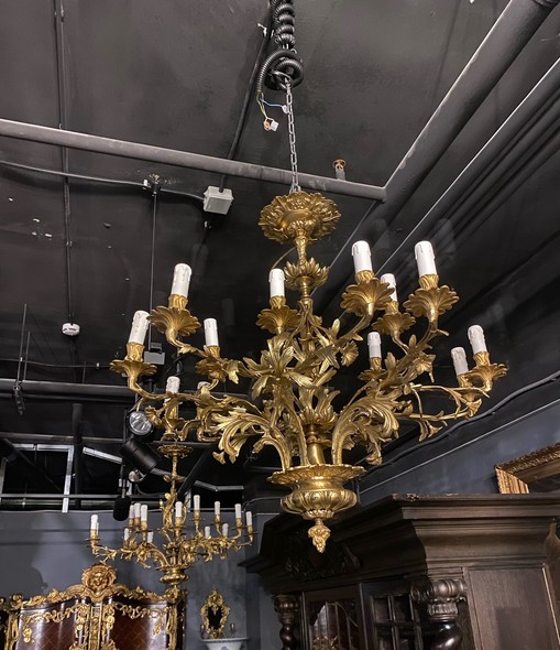 Antique paired chandeliers