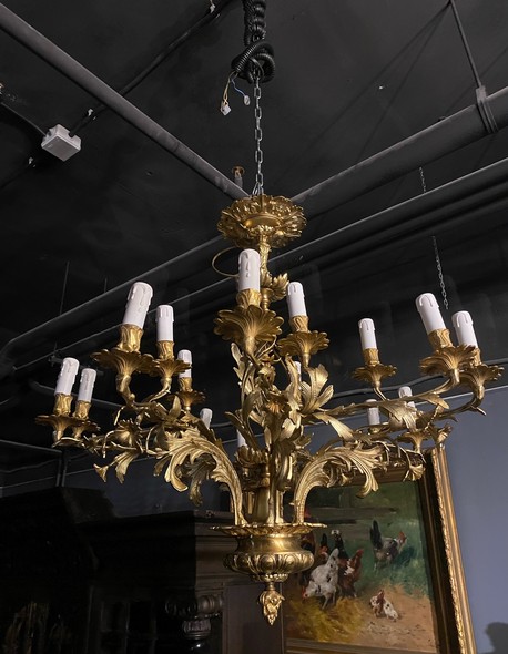 Antique paired chandeliers