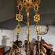 Antique chandelier with decor in the form of patinated angels