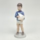 Antique figurine “Boy with a sailboat”