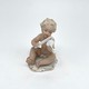 Antique figurine “Putti with violin”