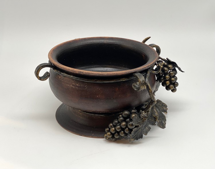 Antique vase with grapevine