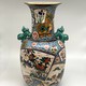 Antique porcelain vase with Fo dogs