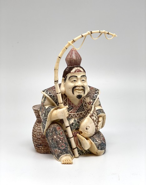 Antique sculpture of the god Ebisu