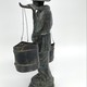 Antique sculpture "The Elder with a yoke"