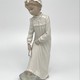 Antique statuette "Girl washing her feet"