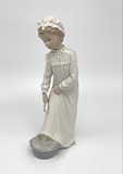 Antique statuette "Girl washing her feet"