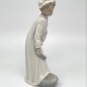 Antique statuette "Girl washing her feet"