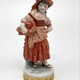 Antique statuette "Girl with a basket"