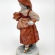 Antique statuette "Girl with a basket"