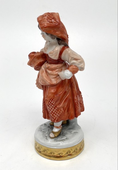 Antique statuette "Girl with a basket"