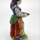 Antique statuette "The girl at the stump"