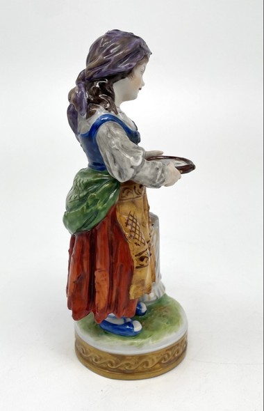 Antique statuette "The girl at the stump"