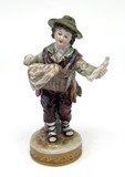 Antique statuette "Boy with a figurine"