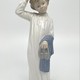 Antique statuette "Boy in pajamas"