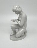 Antique statuette "Nude with water in her palms"