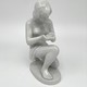 Antique statuette "Nude with water in her palms"