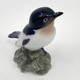 Antique bird figurine