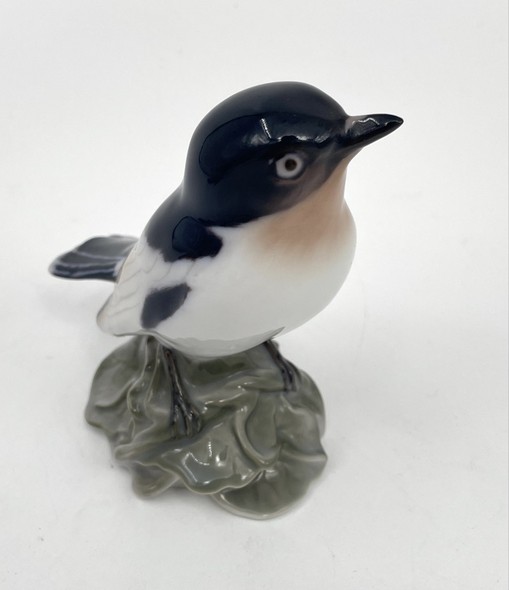 Antique bird figurine