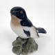 Antique bird figurine