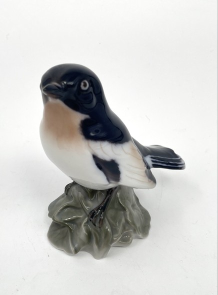 Antique bird figurine