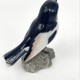 Antique bird figurine