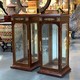 Antique pedestal display cases